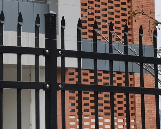 Steel fence featuring classic pressed spear design.